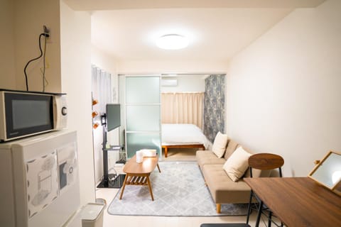 Bed, TV and multimedia, Living room, Photo of the whole room, Seating area, Dining area, Bedroom