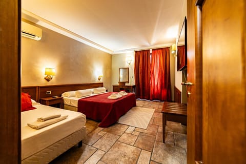 Bed, towels, wardrobe, air conditioner
