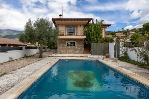 Property building, Living room, Swimming pool