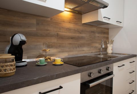 Kitchen or kitchenette, stove