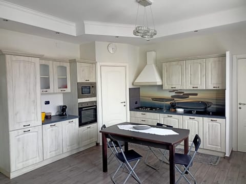 Dining area, dishwasher, oven, stove
