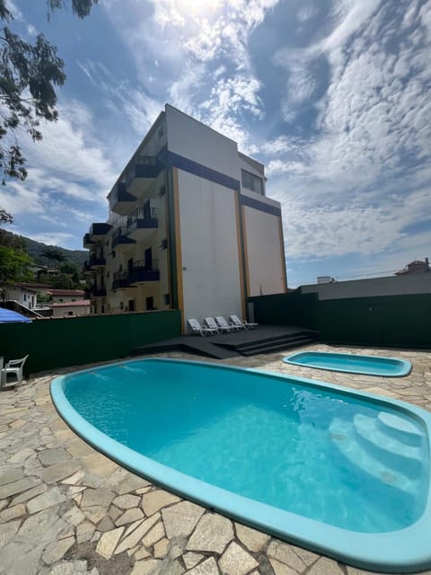 Property building, Day, Natural landscape, Mountain view, Pool view, Swimming pool, sunbed