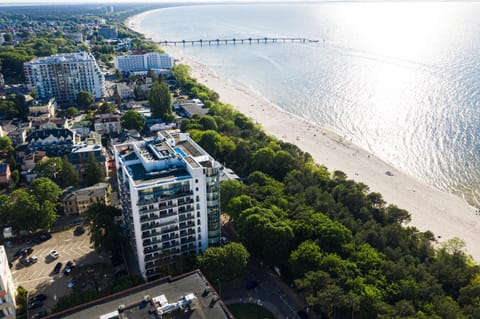 Property building, Nearby landmark, Neighbourhood, Natural landscape, Bird's eye view, Beach, City view