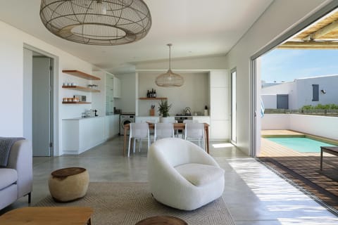 Living room, Seating area, Dining area, Pool view, Swimming pool, kitchen