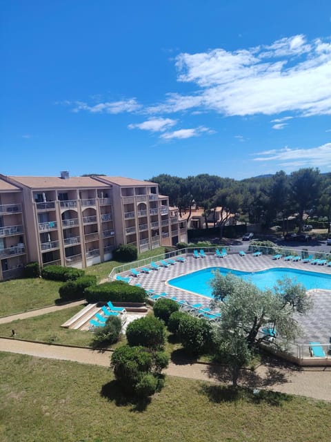 Property building, Day, Natural landscape, Pool view, Swimming pool, sunbed