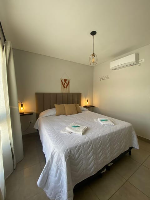 Bed, Photo of the whole room, Bedroom, towels, air conditioner