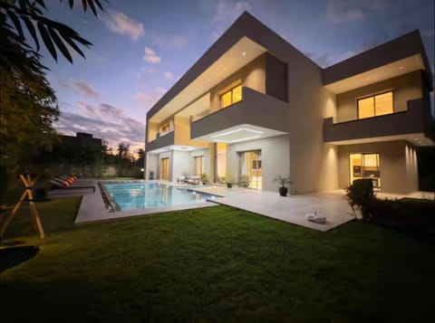 Property building, Patio, Day, Night, Garden, Garden view, Pool view, Swimming pool, sunbed