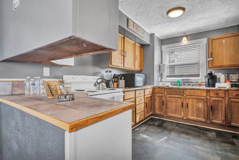 Kitchen or kitchenette, stove, toaster