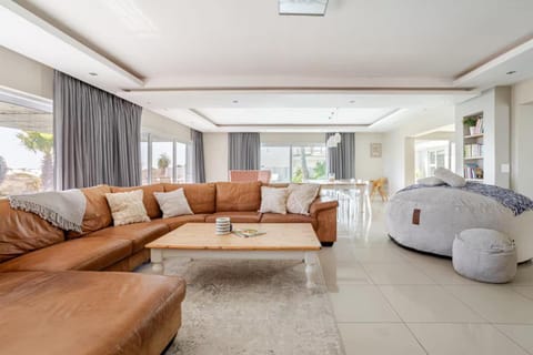 Living room, Seating area, Pool view