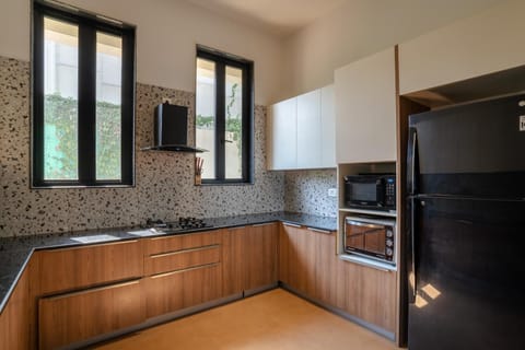 Kitchen or kitchenette, dishwasher, oven, stove