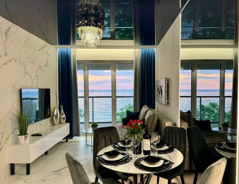 TV and multimedia, View (from property/room), Living room, Seating area, Dining area, Sea view, Sea view