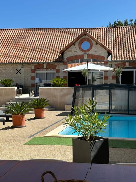 Property building, Patio, Pool view, Swimming pool, sunbed