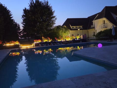 Property building, Night, Swimming pool, Swimming pool