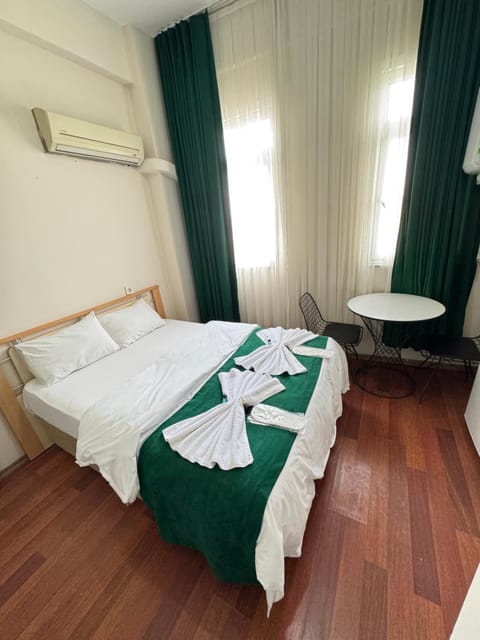 Bed, Photo of the whole room, Bedroom, towels, air conditioner