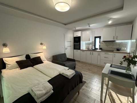 Bed, Kitchen or kitchenette, Garden view, towels