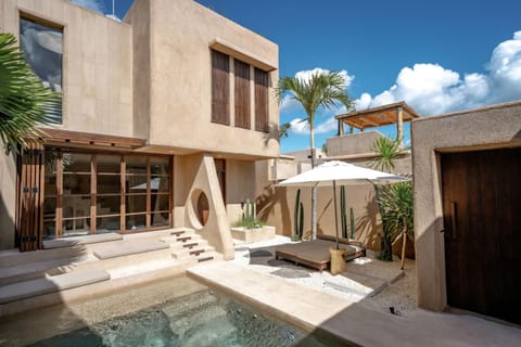 Property building, Patio, Pool view, Swimming pool, sunbed