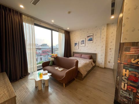 Bed, Living room, Seating area, Bedroom