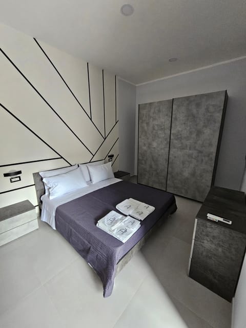 Bed, Photo of the whole room, Bedroom, towels, wardrobe