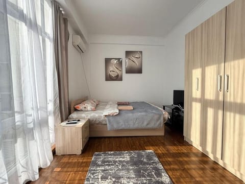 Bed, TV and multimedia, Bedroom, towels, wardrobe, air conditioner