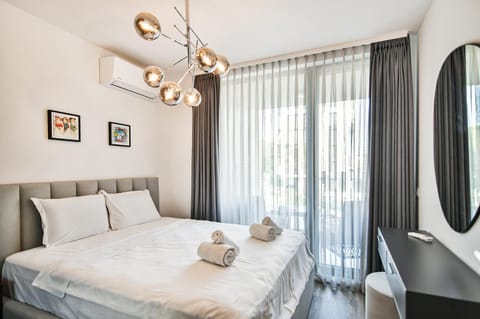 Bed, Photo of the whole room, Bedroom, towels, air conditioner