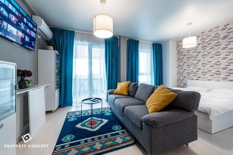 Bed, TV and multimedia, Kitchen or kitchenette, Living room, Photo of the whole room, Seating area, Bedroom