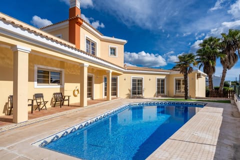 Property building, Living room, Swimming pool