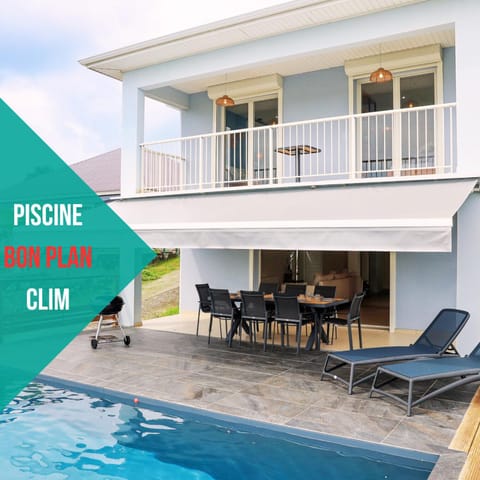 Property building, Patio, Day, Natural landscape, View (from property/room), Balcony/Terrace, Dining area, Text overlay, Pool view, Swimming pool, sunbed