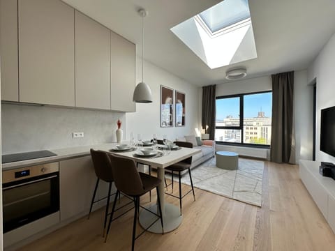 Kitchen or kitchenette, Living room, Seating area, Dining area