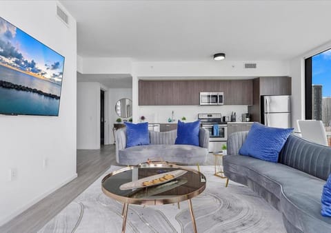 TV and multimedia, Kitchen or kitchenette, Living room, Seating area, oven, stove, toaster