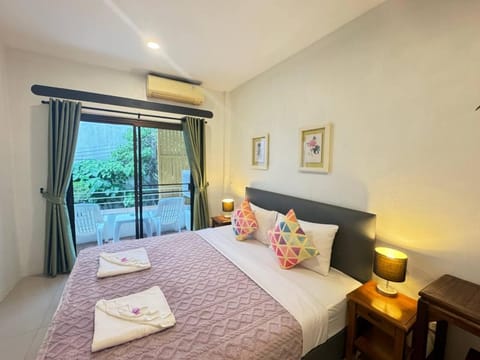 Bed, Balcony/Terrace, Decorative detail, Bedroom, towels, air conditioner