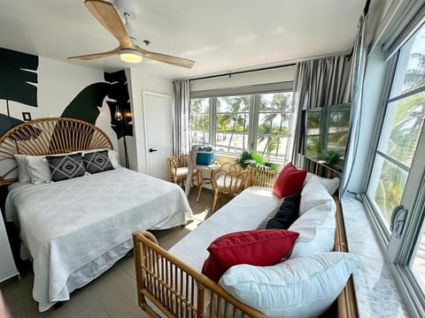 Bed, View (from property/room), Photo of the whole room, Seating area, Beach, Bedroom, Sea view, towels, air conditioner