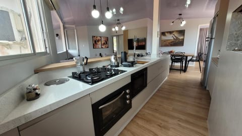 Kitchen or kitchenette, oven, stove