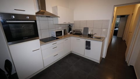 Kitchen or kitchenette, oven, stove