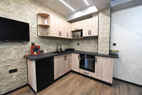 Kitchen or kitchenette, oven, stove