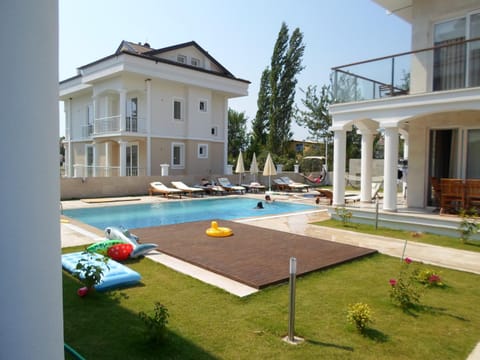 Property building, Patio, Garden, Pool view, Swimming pool