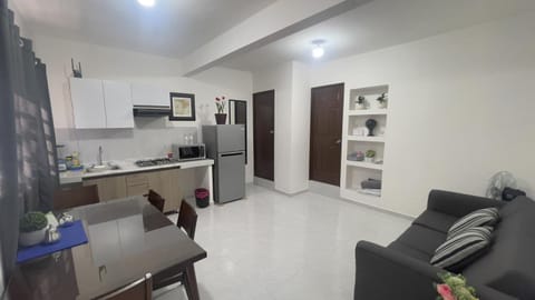 Kitchen or kitchenette, Living room, Seating area, Dining area