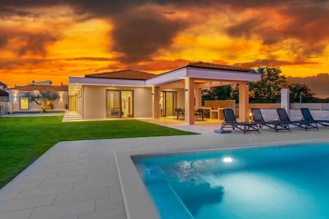 Property building, Patio, Pool view, Sunset, sunbed