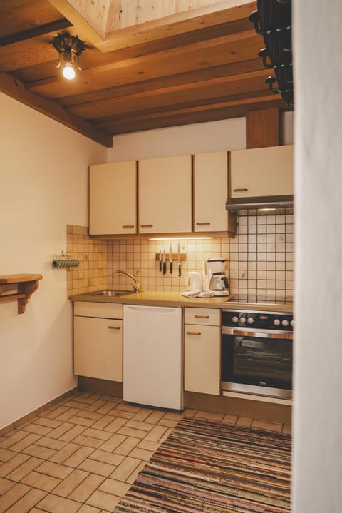 Kitchen or kitchenette, oven, stove