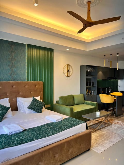 Bed, Living room, Seating area, Bedroom