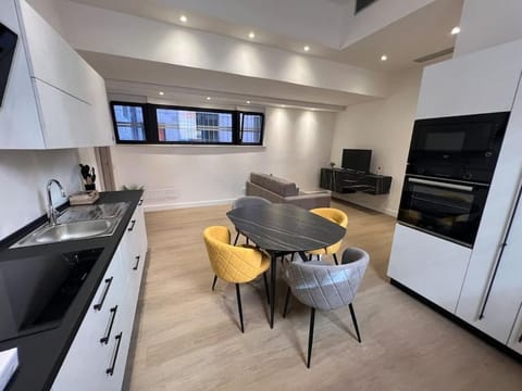 TV and multimedia, Kitchen or kitchenette, Living room, Seating area, Dining area, dishwasher, oven, stove