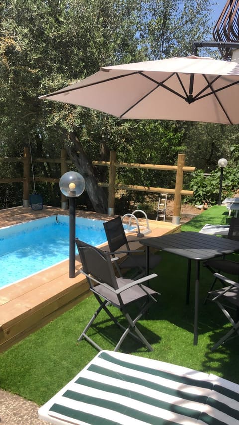 Property building, Living room, Swimming pool