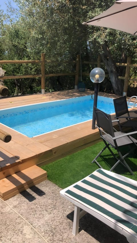 Property building, Living room, Swimming pool