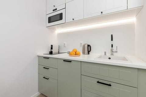 Kitchen or kitchenette, stove