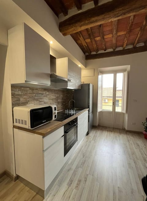 Kitchen or kitchenette, oven, stove