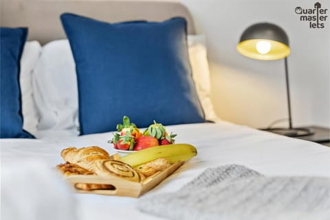 Bed, Decorative detail, Bedroom, furniture, storage, towels, laundry