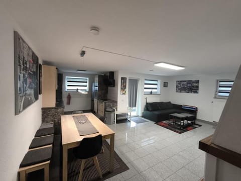 Kitchen or kitchenette, Living room, Seating area, Dining area