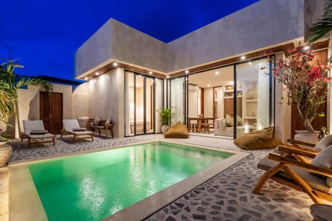 Property building, Patio, Night, Natural landscape, Swimming pool