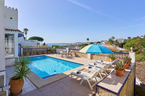 Property building, Living room, Swimming pool