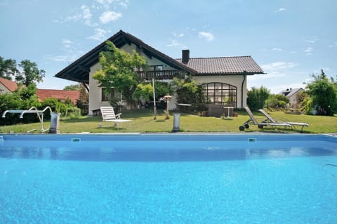 Property building, Living room, Swimming pool