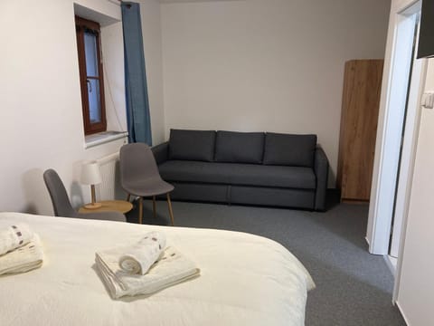 Bed, Seating area, Bedroom
